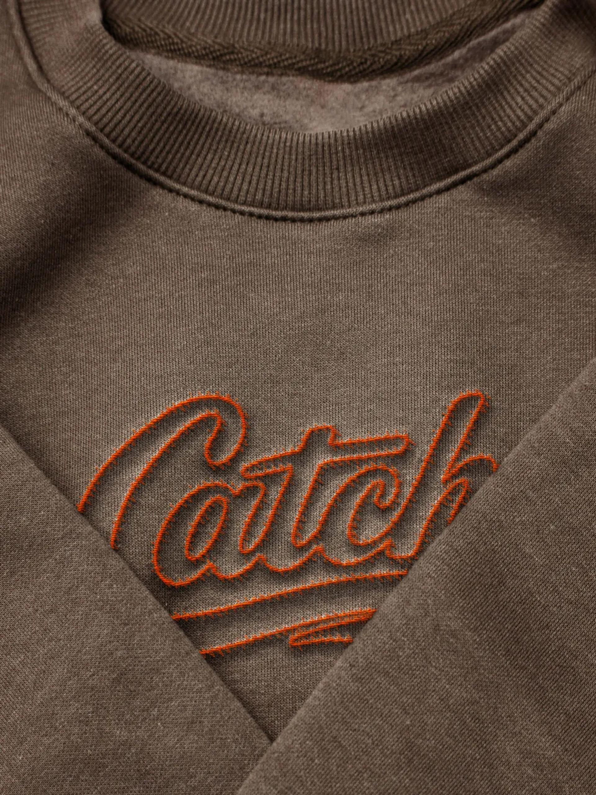 Catch wordmark embroidered on branded merchandise
